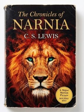 The Chronicles of Narnia Paperback Novel Author C.S. Lewis Fiery Lion Cover
